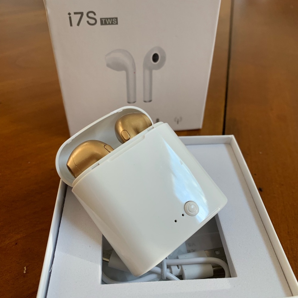 EchoBeat wireless ear buds with charging case.